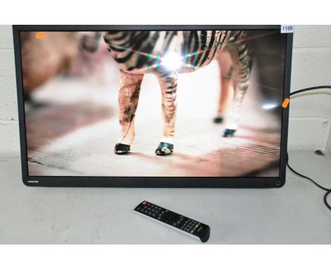 A TOSHIBA 32W2433D 32ins LCD TV with remote, no stand but with wall mounted angled bracket (PAT pass and working)