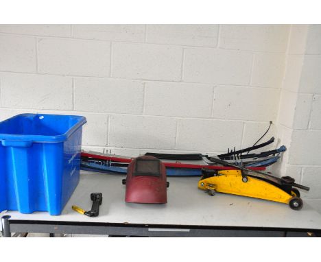 EIGHT FORD SIERRA MK 1 AND MK2 GRILLE MOULDINGS in various colours, a Welding Mask, Trolley Jack and a tray of spanners, scre