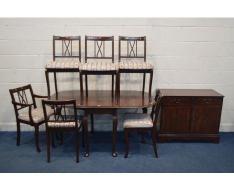 A MAHOGANY GATE LEG TABLE, six chairs including one carver and a two door cabinet (8)