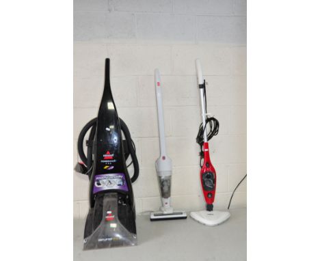 A BISSELL POWERWASH PRO CARPET WASHER, an Argos Cordless Stick vacuum (no PSU and flat) and a Beldray Floor Steamer (all PAT 