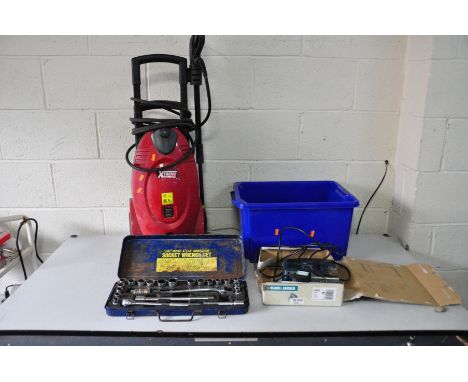 AN XTREME JETWASH with one lance , a Black and Decker Jigsaw (both PAT pass and working), a tray of gardening hand tools and 