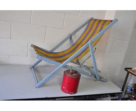 A VINTAGE DECK CHAIR with original striped woven nylon seat and a vintage fuel can (2)