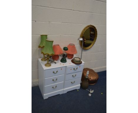 A PAIR OF WHITE THREE DRAWER BEDSIDE CABINETS, along with seven various lamps including a retro ceramic lamp, gilt on plaster