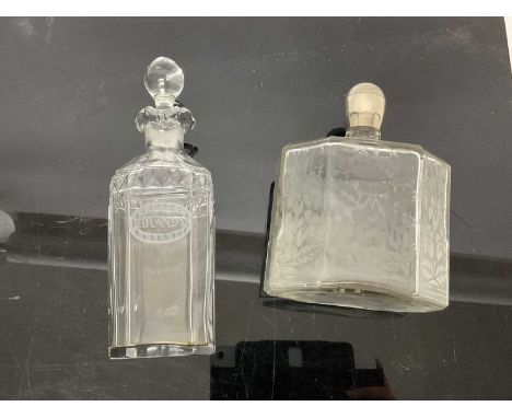 Georgian cut glass decanter with etched 'Brandy' label, and an antique continental octagonal bottle with etched floral decora