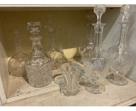 Victorian cut and etched glass decanter, 19th century armorial cut glass beaker, and five other glass decanters