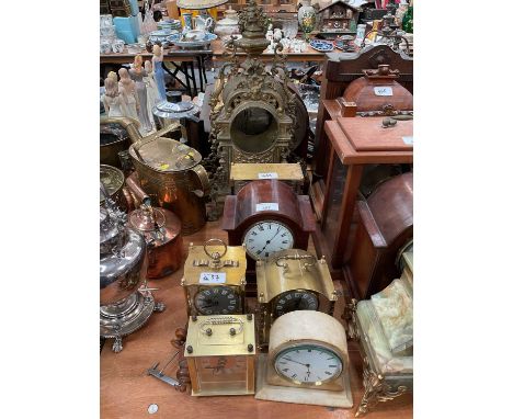 Early 20th century mantel clock in lancet shaped case, two anniversary clocks and others.
