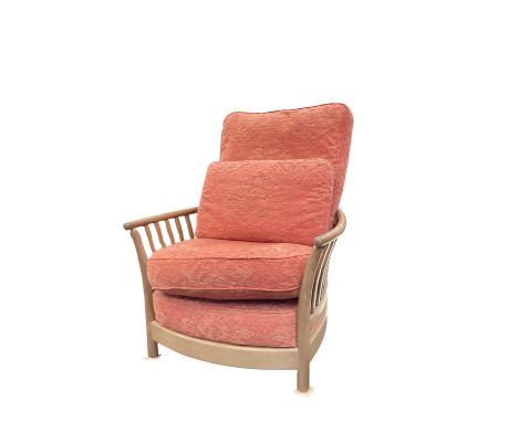 Ercol Renaissance armchair with loose cushions, together with an Ercol stick back elbow chair (2)