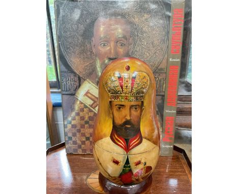 Large 10 piece Russian nesting doll, together with a Russian iconography book