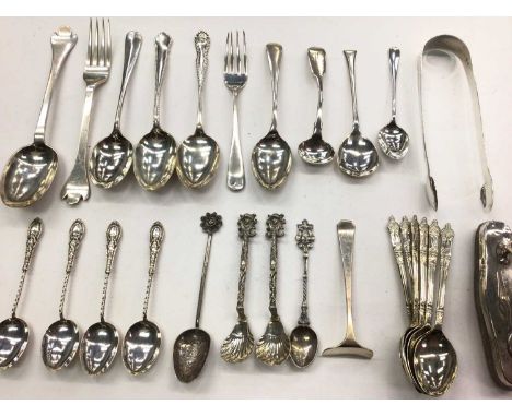 Group of various silver teaspoons and flatware, pair of silver sugar tongs, silver mounted nail buffer and set of six silver 