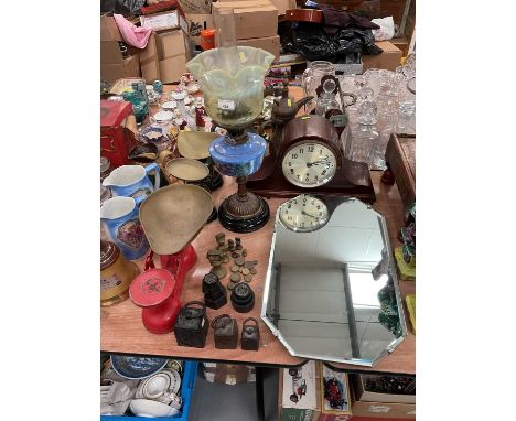 Oil lamp with Vaseline glass shade, two sets of vintage kitchen scales, mantel clock, mirror and trays.Appears to be in good 