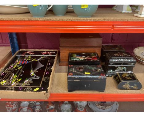 Japanese lacquer boxes and a papier-mâché tea caddy