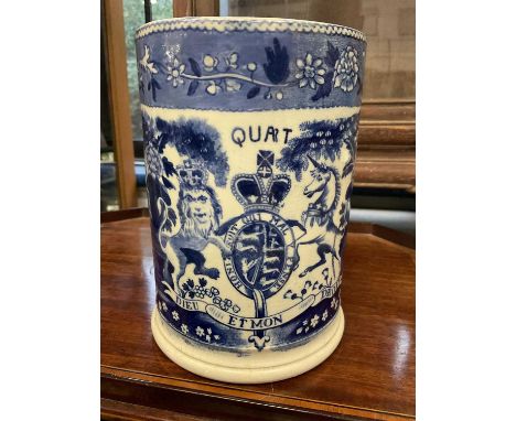 Large 19th century Staffordshire pottery quart size tankard with transfer printed blue and white Royal coat of armsProfession