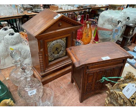 Early 20th century mantel clock together with a Japanese table top wooden cabinet (2)