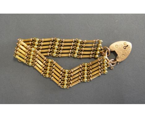 A 15 ct. Gold Gate Linked Bracelet With Padlock Clasp, 35.4 gms 