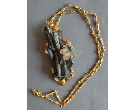 A 9ct. Gold, Tourmaline Set Pendant, with 9ct. gold linked chain, 66.5 gms all in 