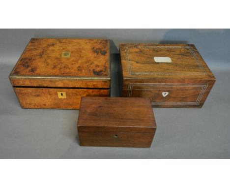 A 19th Century Rose Wood Mother Of Pearl Inlaid Dressing Case, the hinge cover enclosing a fitted interior with glass bottles