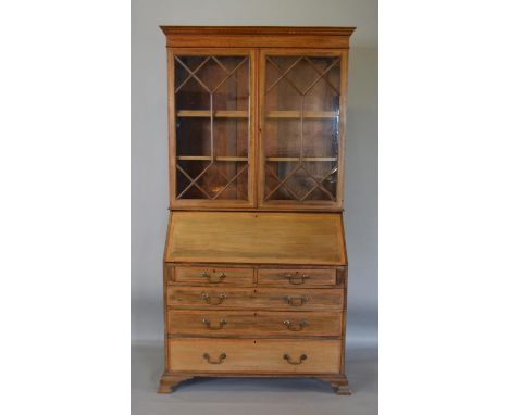 An Edwardian Mahogany Satinwood Inlaid Bureau Bookcase the moulded cornice above two astragal glazed doors enclosing shelves,