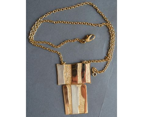 An 18ct. Gold Pendant of Abstract Form In Two Sections together with an 18ct. gold heavy linked chain, 38 gms 