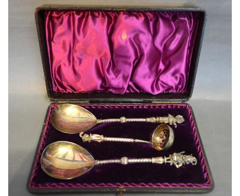 An Unusual Set of Three Victorian Silver Plated Spoons, the handles in the form of Punch, to include a pair of large spoons a
