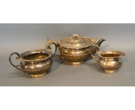 An Edwardian Silver Three Piece Tea Service of Circular Half Load Form, Sheffield 1902, 56 ozs all in 
