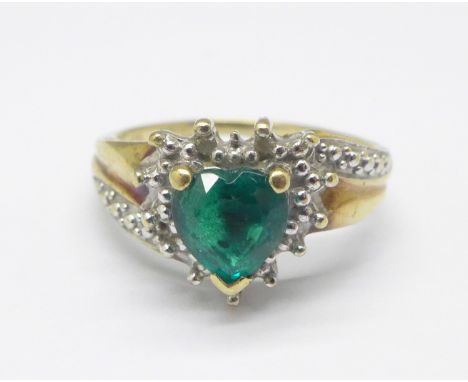 A 9ct gold, diamond and green stone ring, 2g, K 