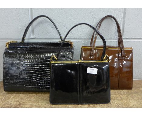 Three vintage patent leather handbags with suede linings 