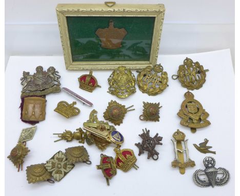 A collection of military and other badges including a silver parachute badge by E &amp; H Simon Inc., Royal Army Ordnance Cor