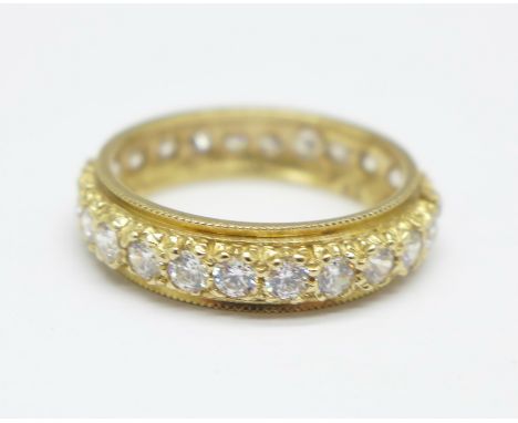 A 9ct gold and cubic zirconia eternity ring, 2.7g, M 