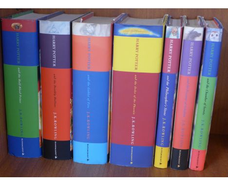 Seven Harry Potter books including four first editions 