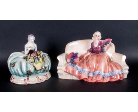 Katzhutte Fine Porcelain Figure. c.1920's ' Lady with Fan ' Clothed In an Orange / Pink Dress, Seated on a Settee. Marked 262