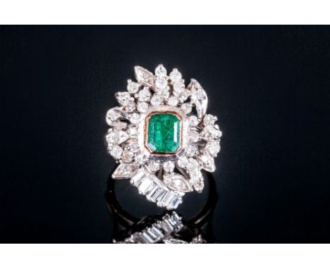 Art Deco 18ct White Gold Set Emerald & Diamond Cluster Ring, the central emerald surrounded by Baguette and Brilliant Cut Dia