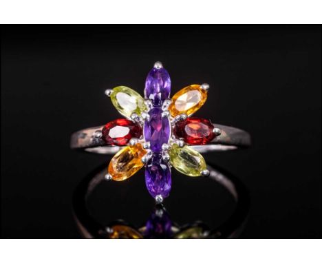 Multi Gemstone Flower Ring, the petals formed from marquise cut red garnets, amethysts, peridots and citrines, surrounding an