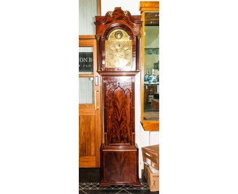 A Fine Quality Mahogany Cased, Late Georgian Brass Faced Long Case Clock with a brass arch dial with sunbursts, and 8 day mov