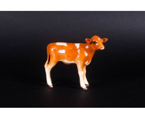 Beswick Animal Figure ' Guernsey Calf ' Gloss Golden Brown and White. Model Num.1249A. Designer A. Gredington. Height 2.75 In