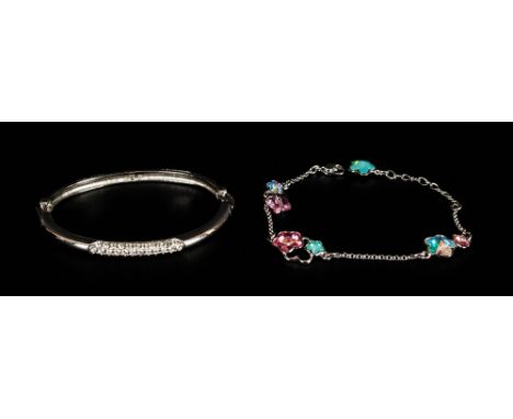 Swarovski Bangle and Bracelet, the bangle with articulated links and three panels of small white crystals, the bracelet with 