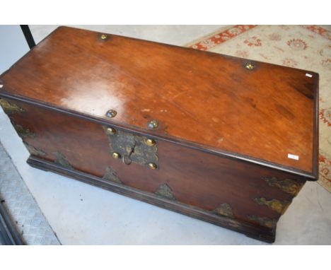 A large 19th century brass bound and handled mahogany/teak maritime/seafarers' chest with ornate brass straps and handles , d
