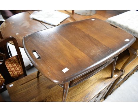 A vintage dark stained Ercol tray style coffee table,&nbsp;Few marks and scuffs, frame seems sound with no visible worm