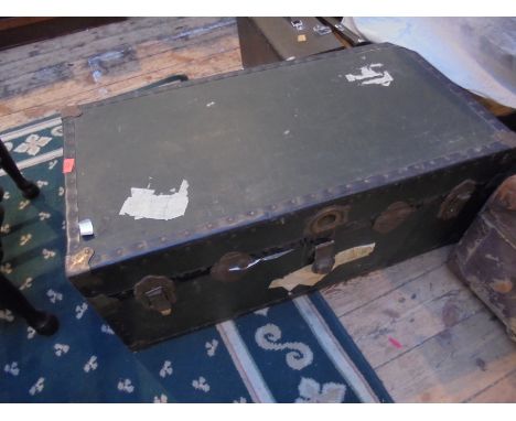 Large solid trunk in green, brass fittings