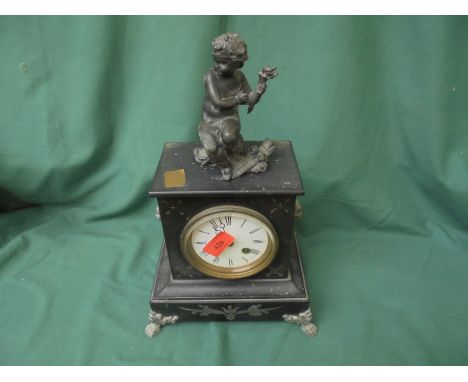 Slate mantel clock with decorative figurines to top, Roman numerals on white face