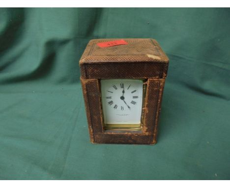 Small brass carriage clock with enamelled face by Mappin & Webb, London, French make in original case