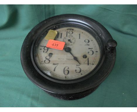 Unusual bulk head clock possibly 1930's of plastic style design in black marked Seth Thomas, made in USA