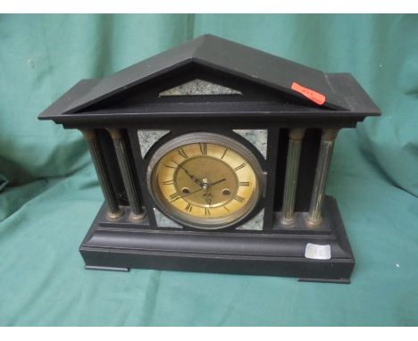 Large bracket clock in having slate effect surround with Grecian pillars, enamelled face