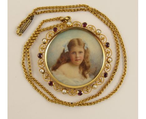 A double sided portrait locket circa first quarter of the 20th century, of a young lady in her party dress and on the reverse