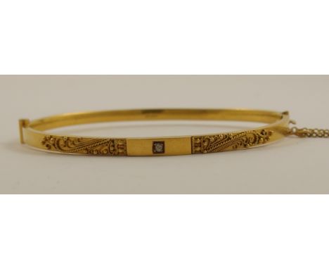 A 15ct diamond set bangle with fine wire and grainwork, hallmarked Chester 1911, diameter 6cm