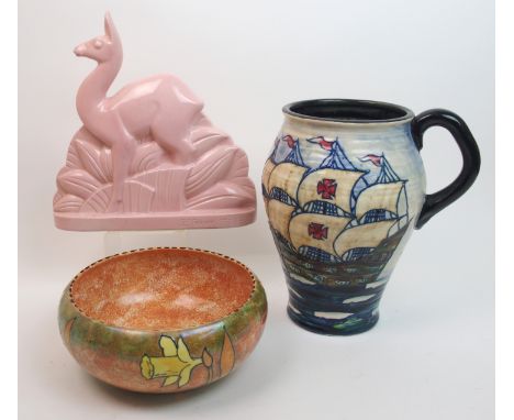 A Royal Cauldon jug with tube lined decoration of a galleon in full sail, possibly designed by Frederick Rhead, 25.5cm high, 