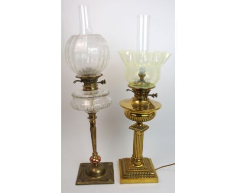A Victorian brass Corinthian column oil lamp with frilled glass shade and funnel converted to electricity, 70cm high and anot