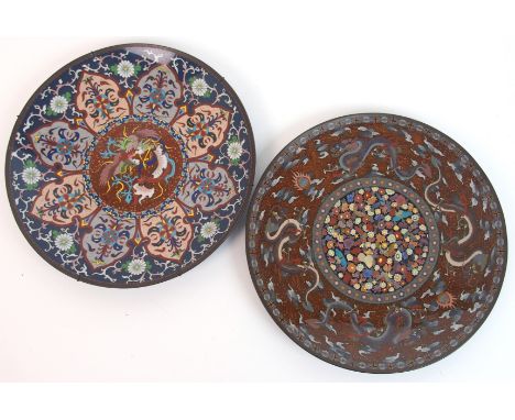 A cloisonne enamel plaque decorated with Ho-o within formal foliate panels, 30.5cm diameter and another with dragons surround