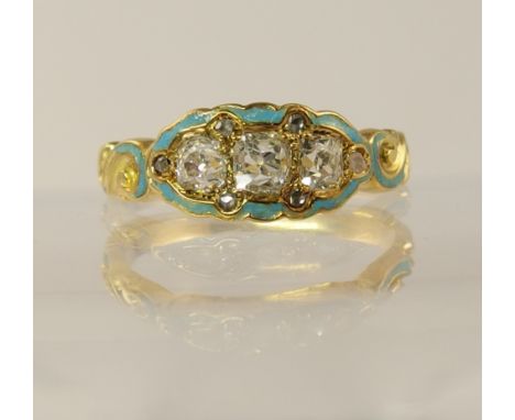 A Victorian three stone diamond ring diamond total approx 0.30cts, with turquoise enamel detail, to the bright yellow metal s