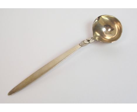 Georg Jensen, a Sterling silver cream ladle in the 'cactus' pattern designed by Gundorph Albertus circa 1930, 16cm long