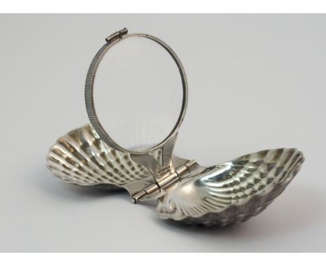 A novelty Sterling silver jeweller's loupe by Tiffany & Company, modelled as a clam shell, 11.5cm wide when open